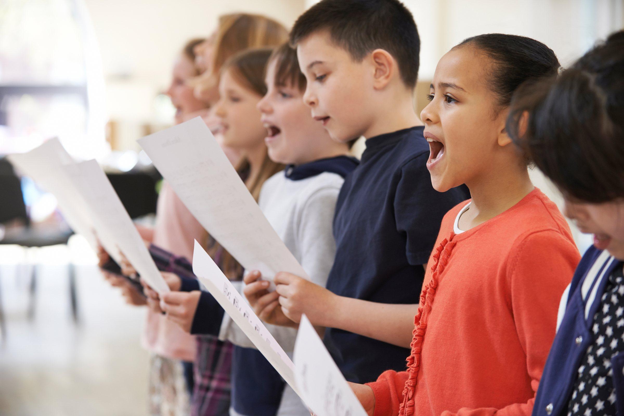 Two girls singing together